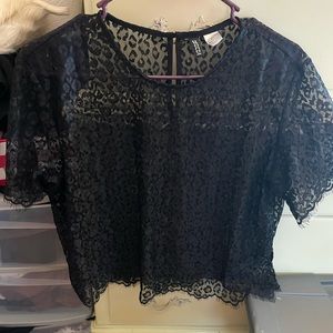 Divided black lace top